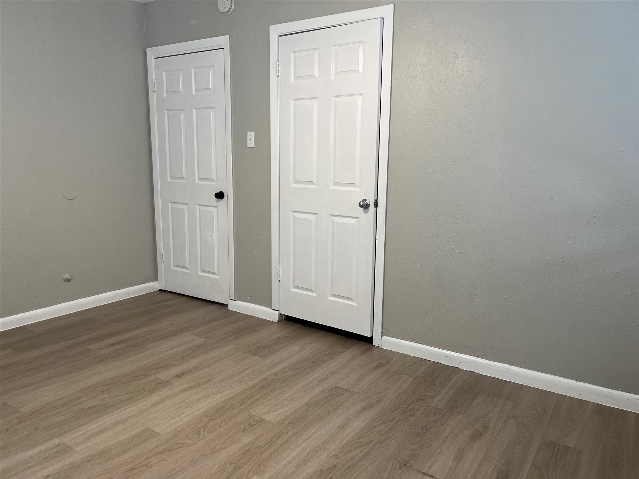 13125 Joliet Street Houston, TX 77015 - Photo 16 of 39 a view of wooden floor and windows in a room