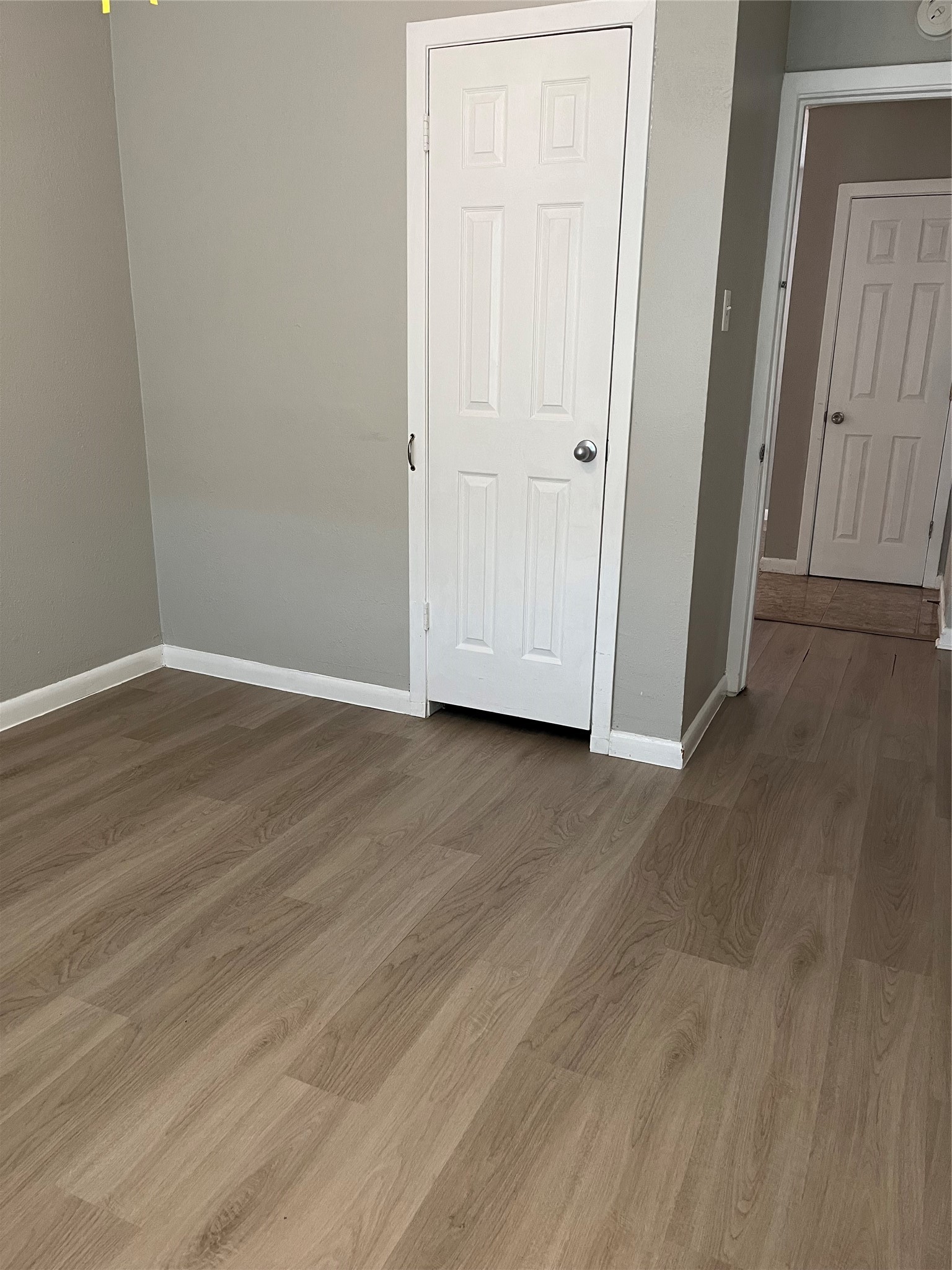 13125 Joliet Street Houston, TX 77015 - Photo 19 of 39 an empty room with wooden floor