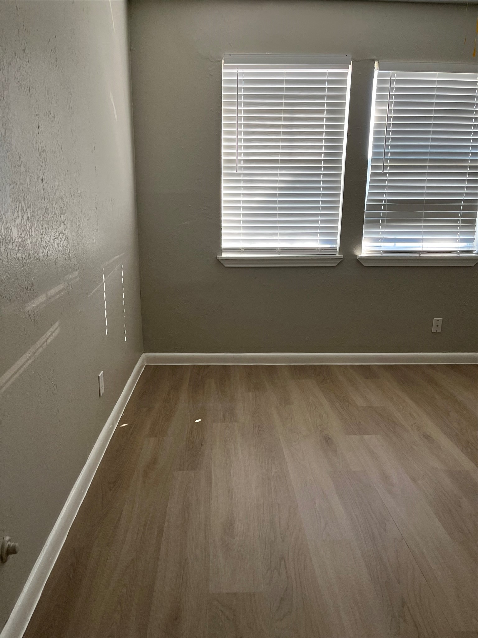 13125 Joliet Street Houston, TX 77015 - Photo 22 of 39 a view of a room with wooden floor and a window