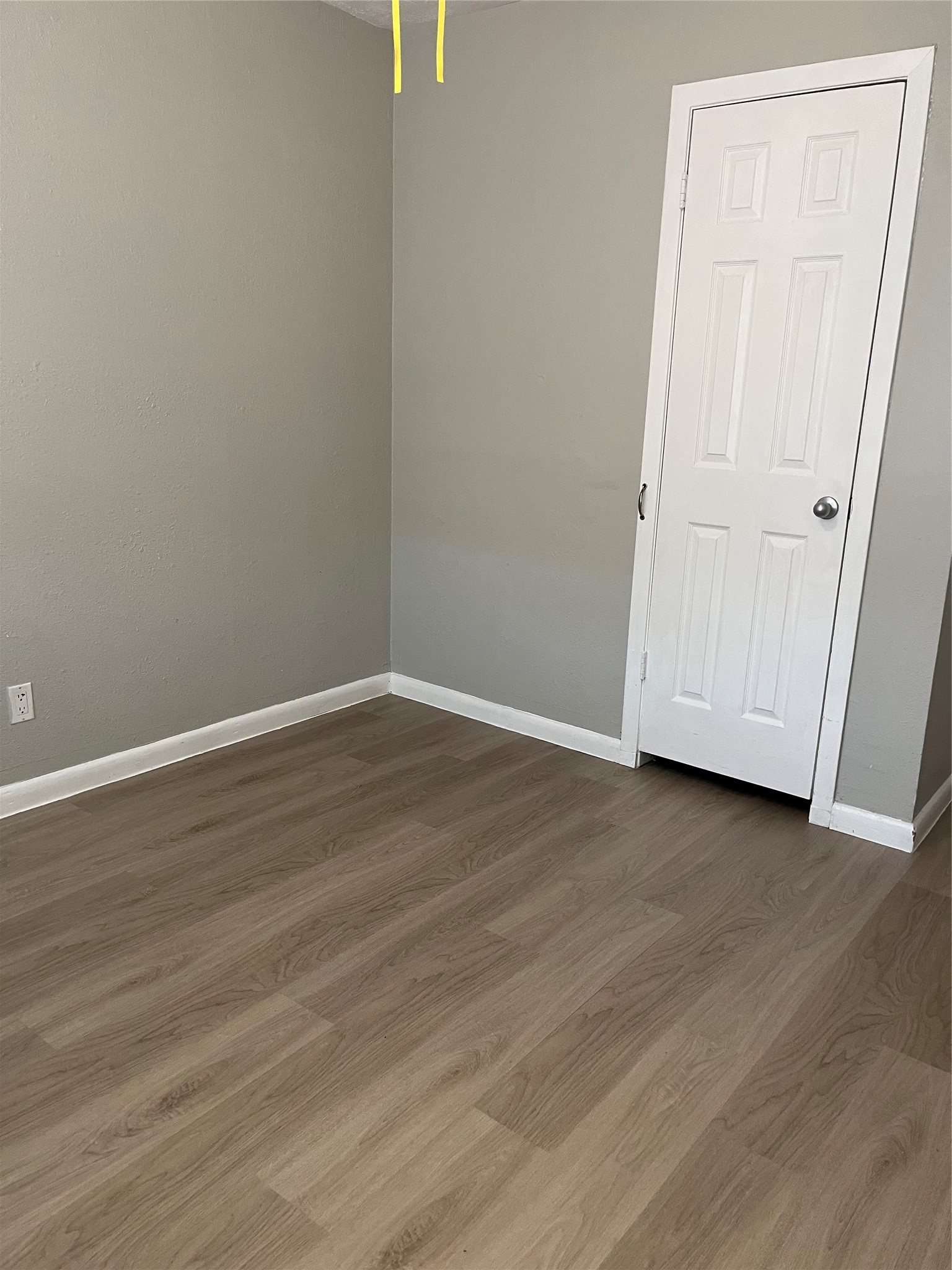 13125 Joliet Street Houston, TX 77015 - Photo 24 of 39 a view of an empty room with wooden floor