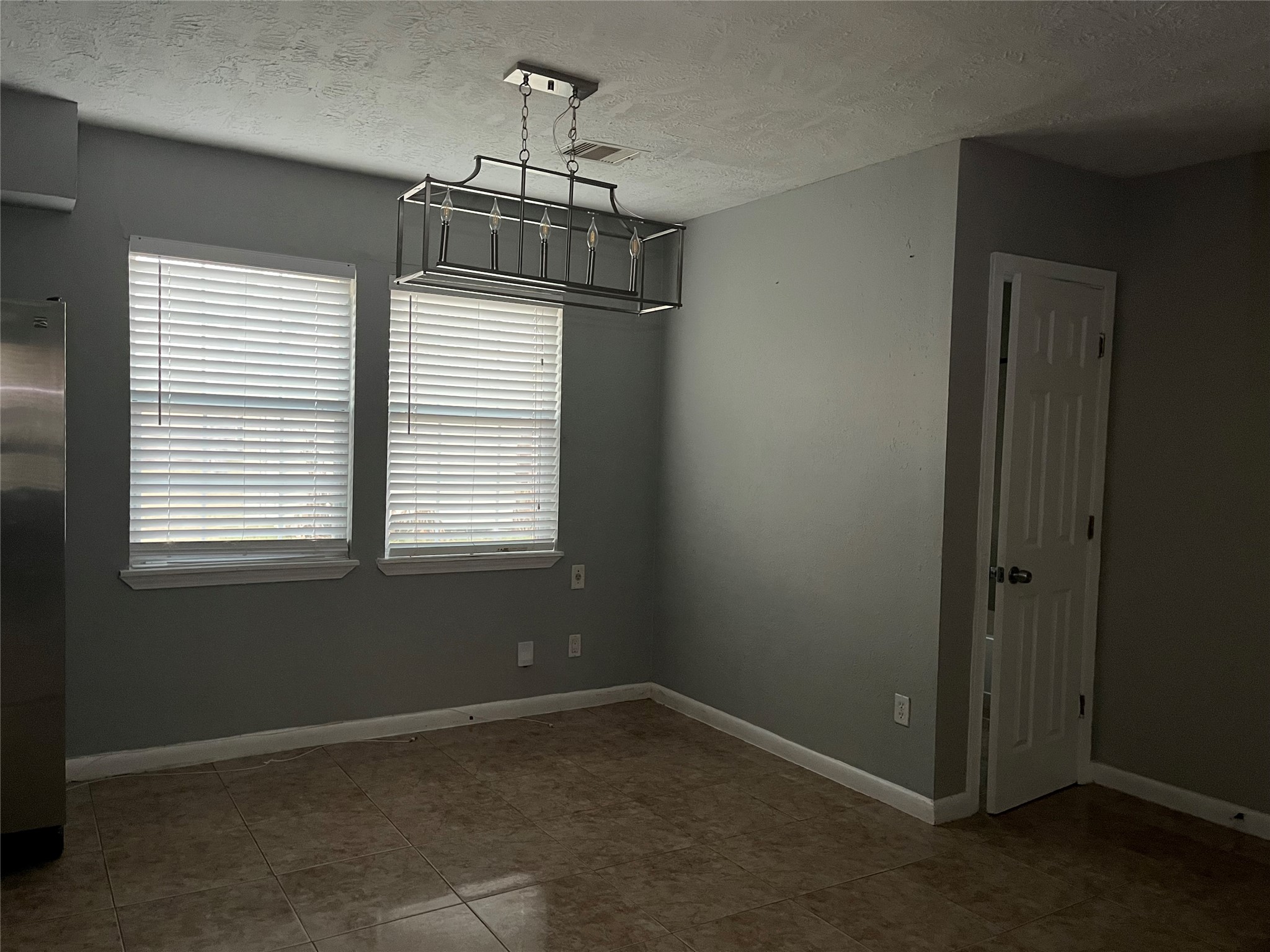13125 Joliet Street Houston, TX 77015 - Photo 30 of 39 an empty room with a window