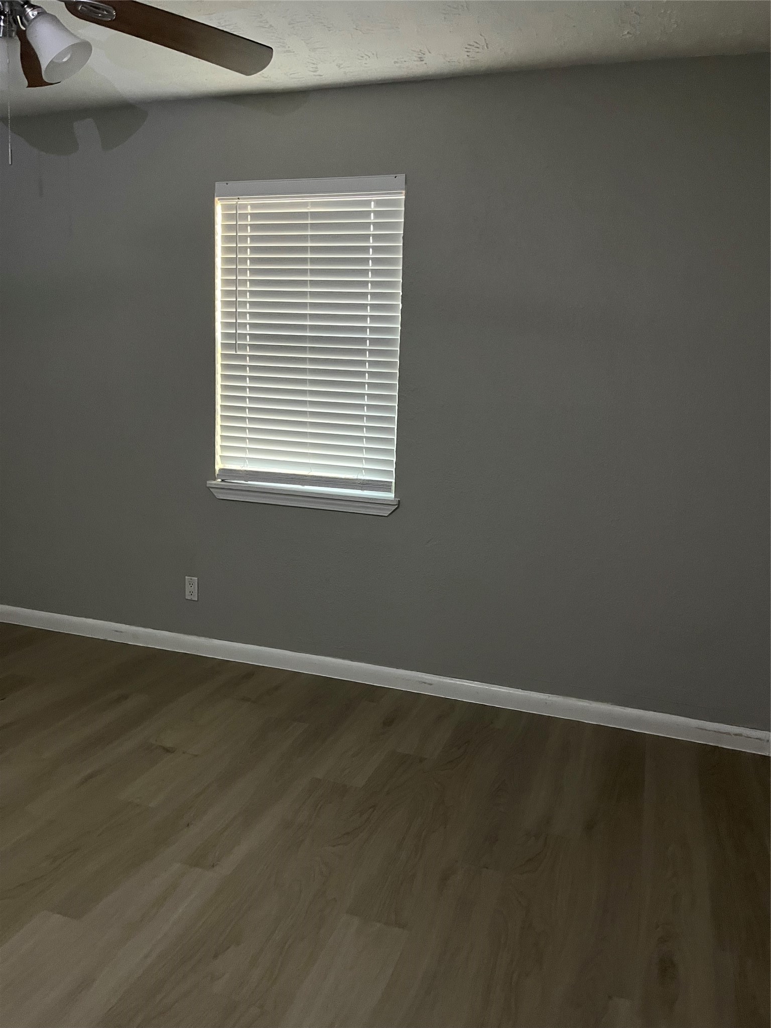 13125 Joliet Street Houston, TX 77015 - Photo 32 of 39 a view of an empty room with wooden floor and a window