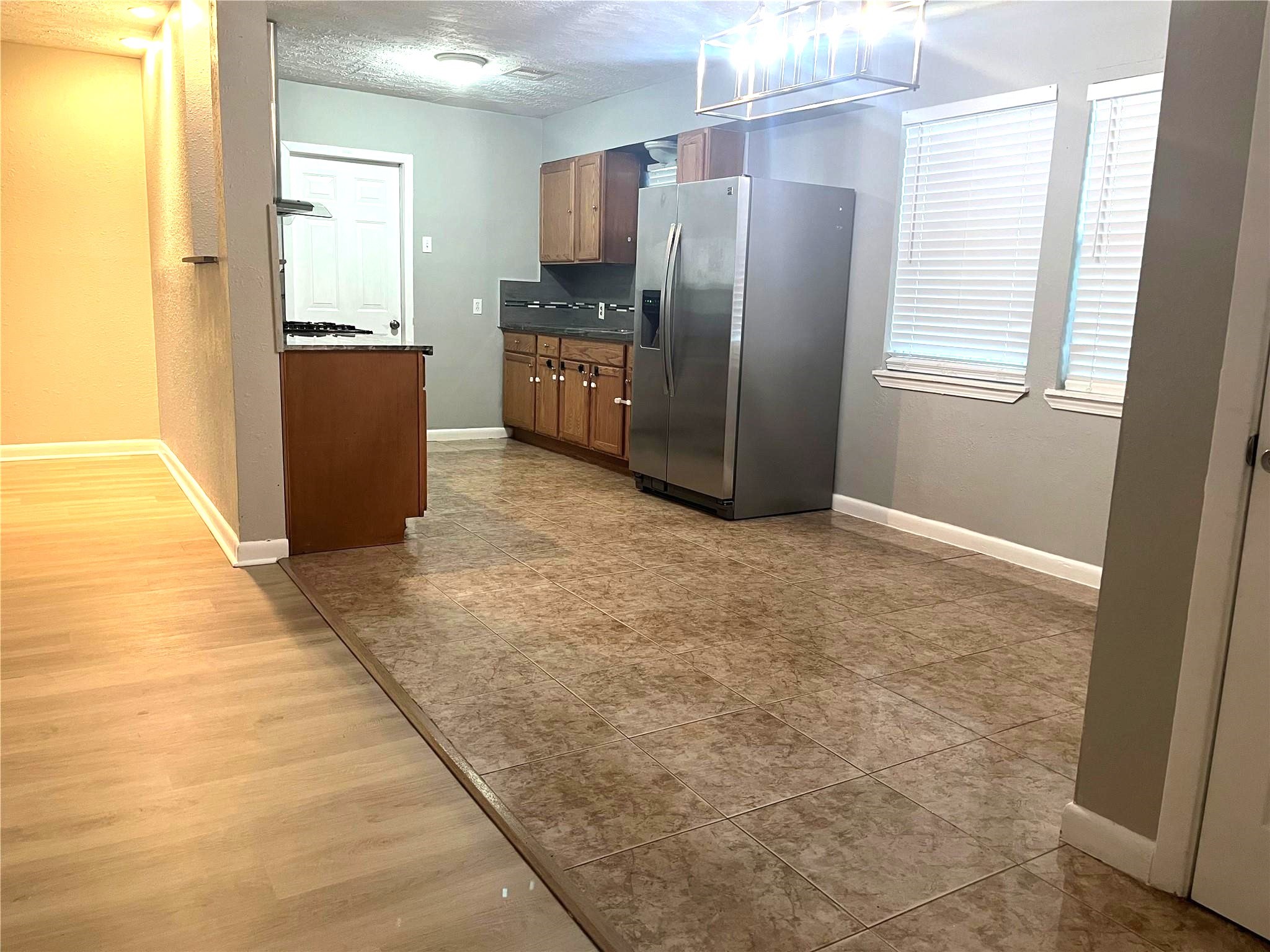 13125 Joliet Street Houston, TX 77015 - Photo 8 of 39 a kitchen with stainless steel appliances granite countertop a refrigerator and a stove