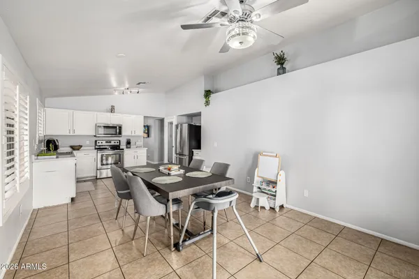 a view of a dining room with furniture