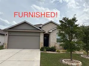 a sign that is on the side of the house