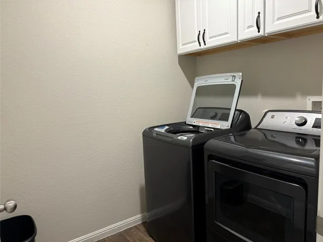 a view of a workspace with furniture