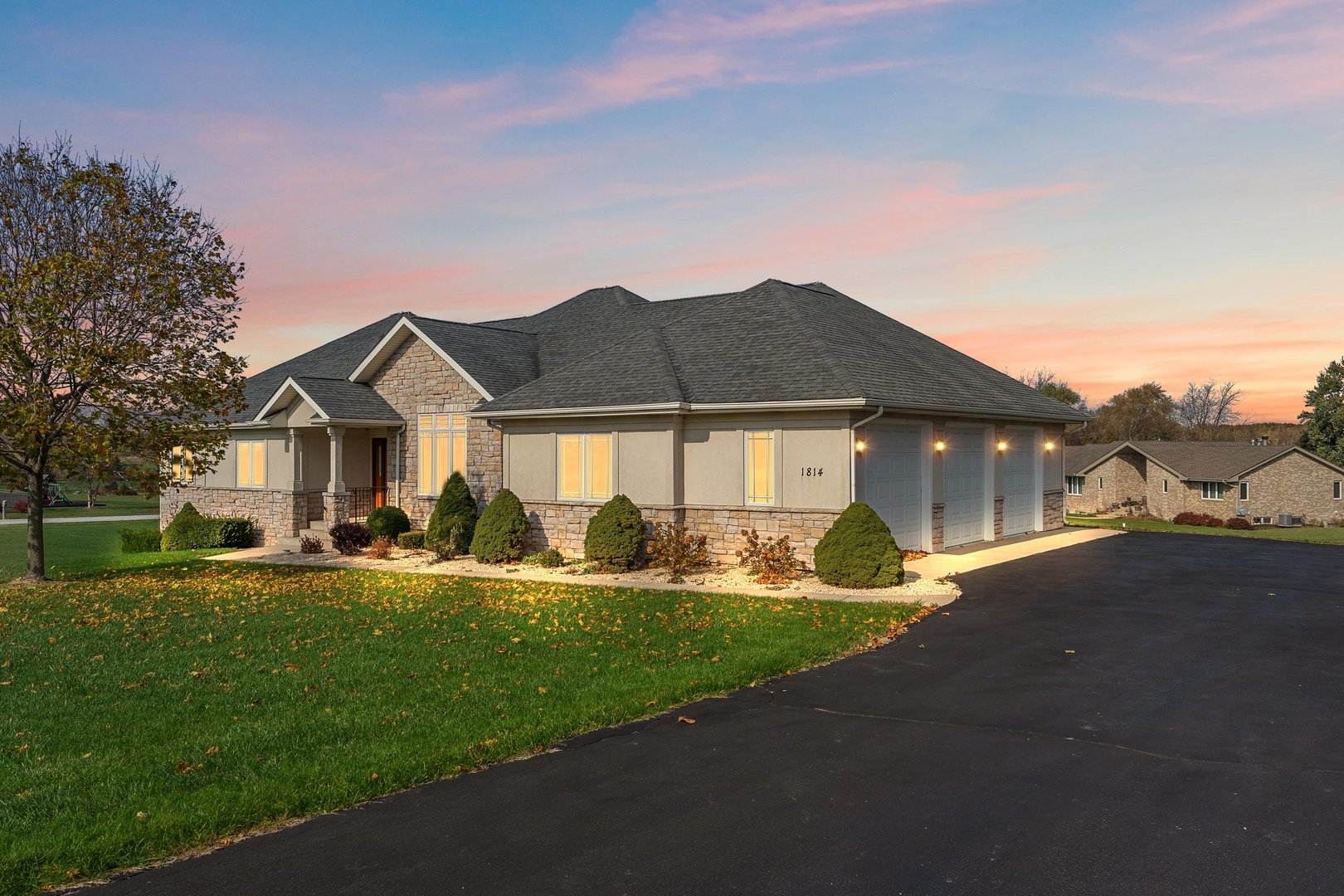 1814 East Offner Road Crete, IL 60417 - Photo 5 of 59 a front view of a house with a yard table and chairs