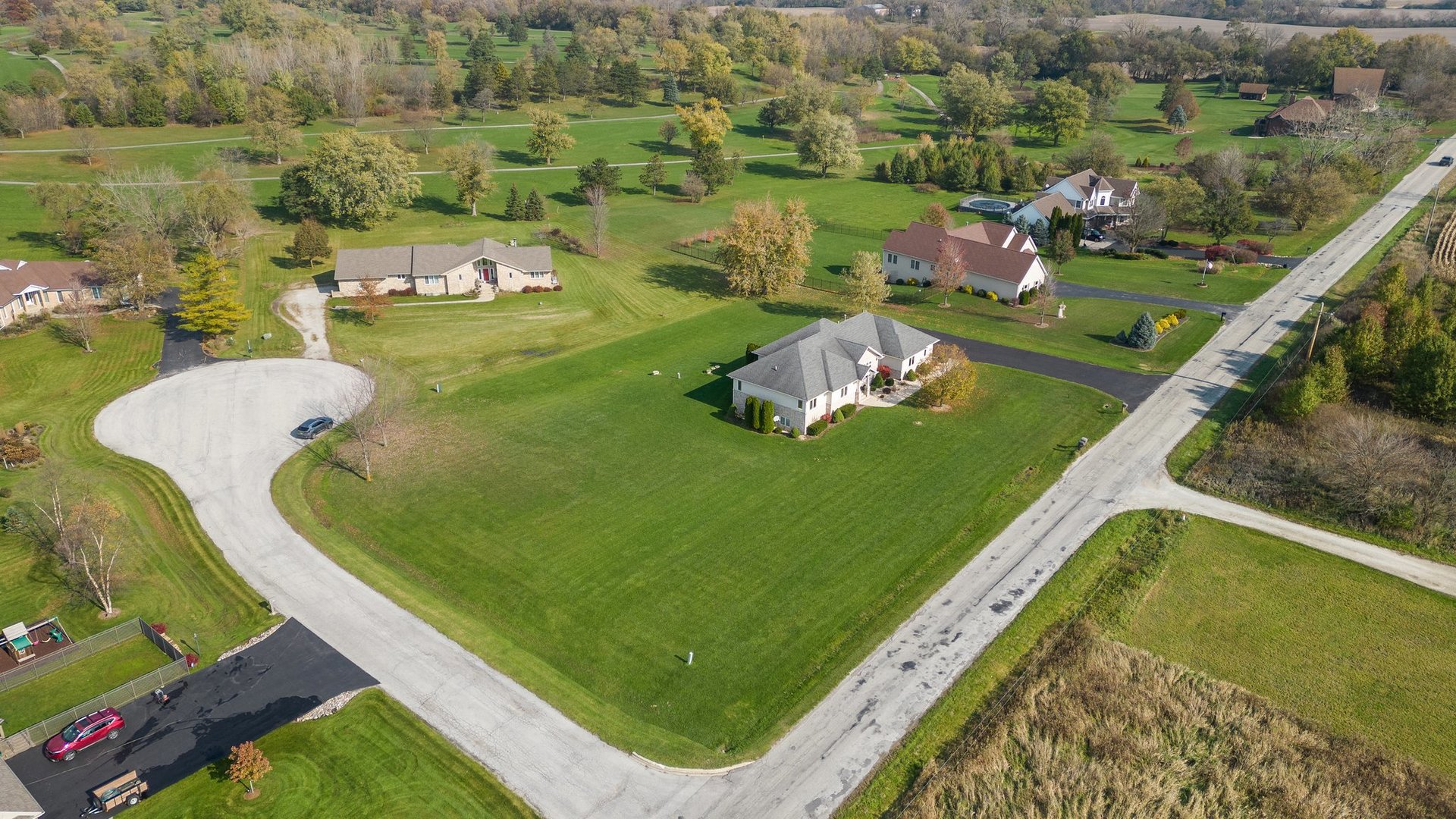 1814 East Offner Road Crete, IL 60417 - Photo 54 of 59 an aerial view of a golf course with parking space