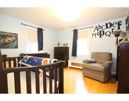 4 Jr Avenue Methuen, MA 01844 - Photo 15 of 23 a living room with furniture and a flat screen tv