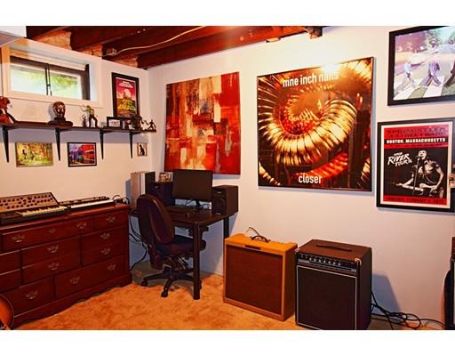4 Jr Avenue Methuen, MA 01844 - Photo 21 of 23 a living room with furniture and a flat screen tv