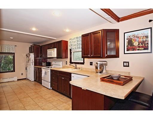 4 Jr Avenue Methuen, MA 01844 - Photo 9 of 23 a kitchen with a sink cabinets and wooden floor