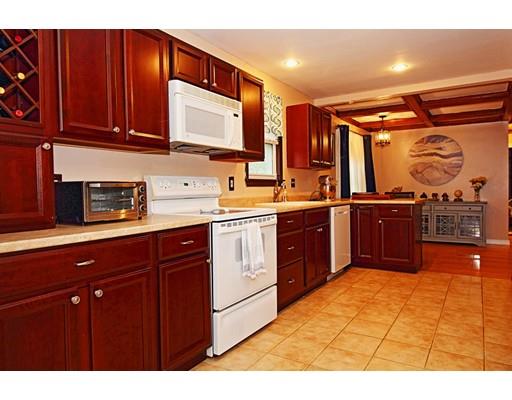 4 Jr Avenue Methuen, MA 01844 - Photo 10 of 23 a kitchen with stainless steel appliances granite countertop a sink and cabinets