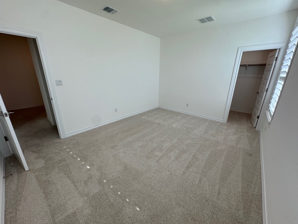 309 Wolf Rdg Road Georgetown, TX 78628 - Photo 25 of 25 Bedroom 5 with full bath just outside the door and walk in closet.