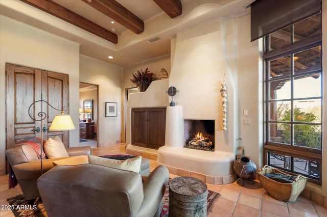 a kitchen with stainless steel appliances granite countertop a stove and a refrigerator