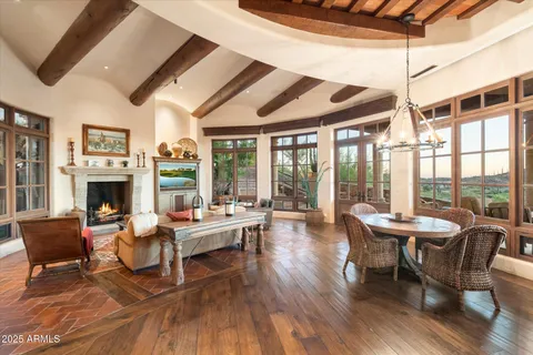 a kitchen with a sink and a large window