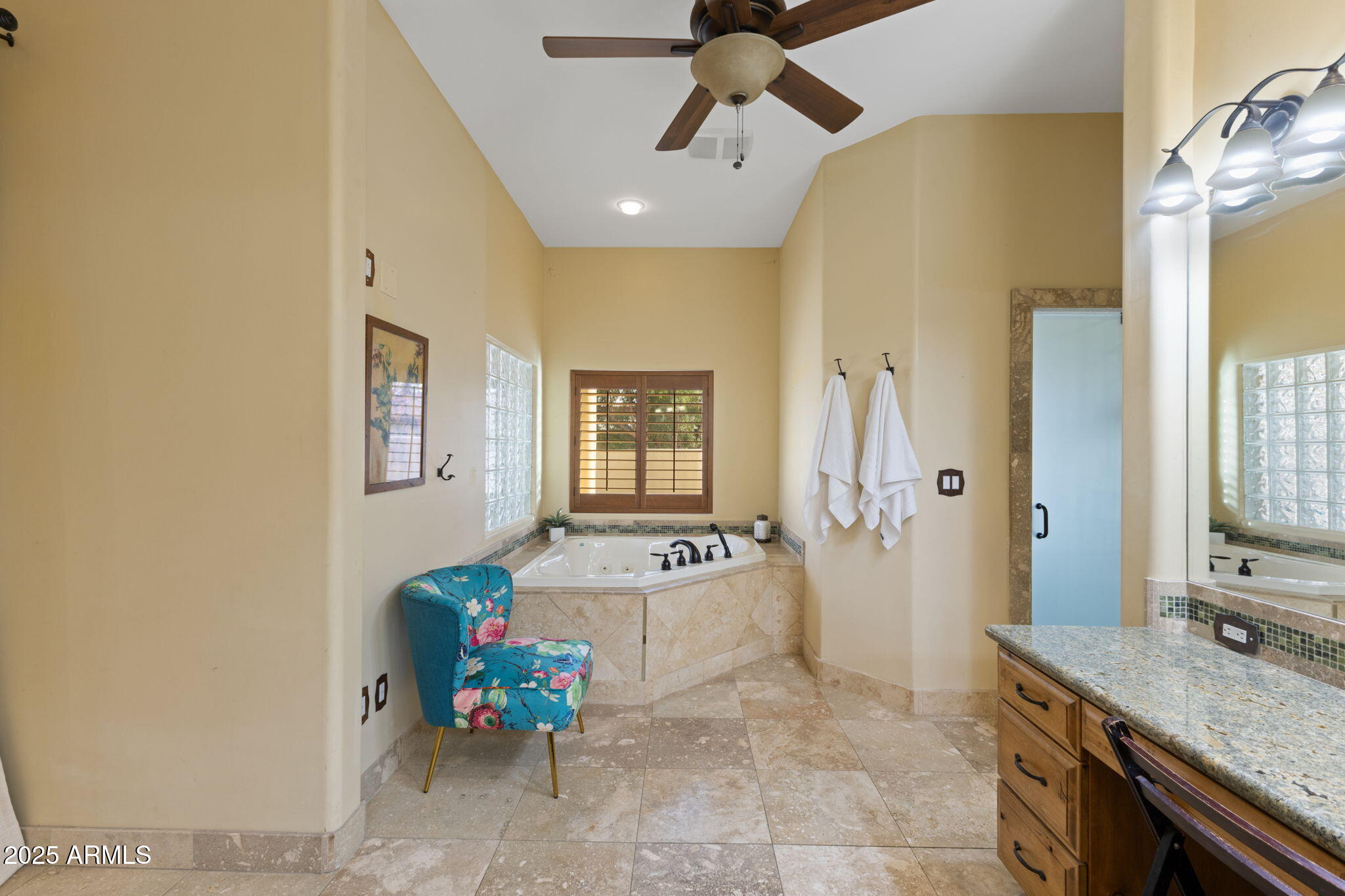 8821 North 9th Avenue Phoenix, AZ 85021 - Photo 13 of 36 a spacious bathroom with a granite countertop sink a mirror and shower