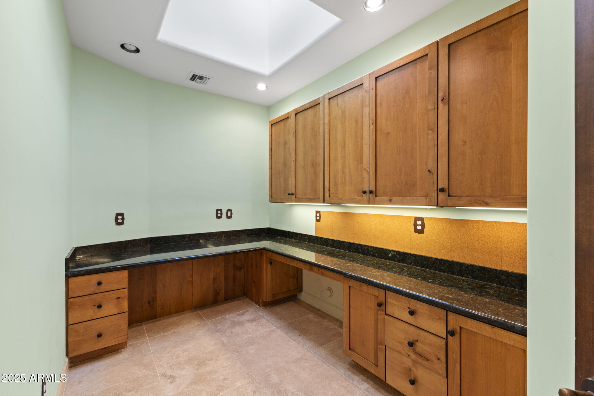 8821 North 9th Avenue Phoenix, AZ 85021 - Photo 26 of 36 a kitchen with granite countertop cabinets and sink