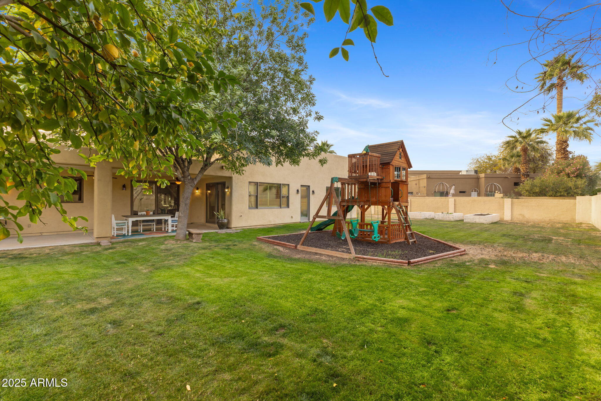 8821 North 9th Avenue Phoenix, AZ 85021 - Photo 29 of 36 a view of a house with a backyard porch and sitting area
