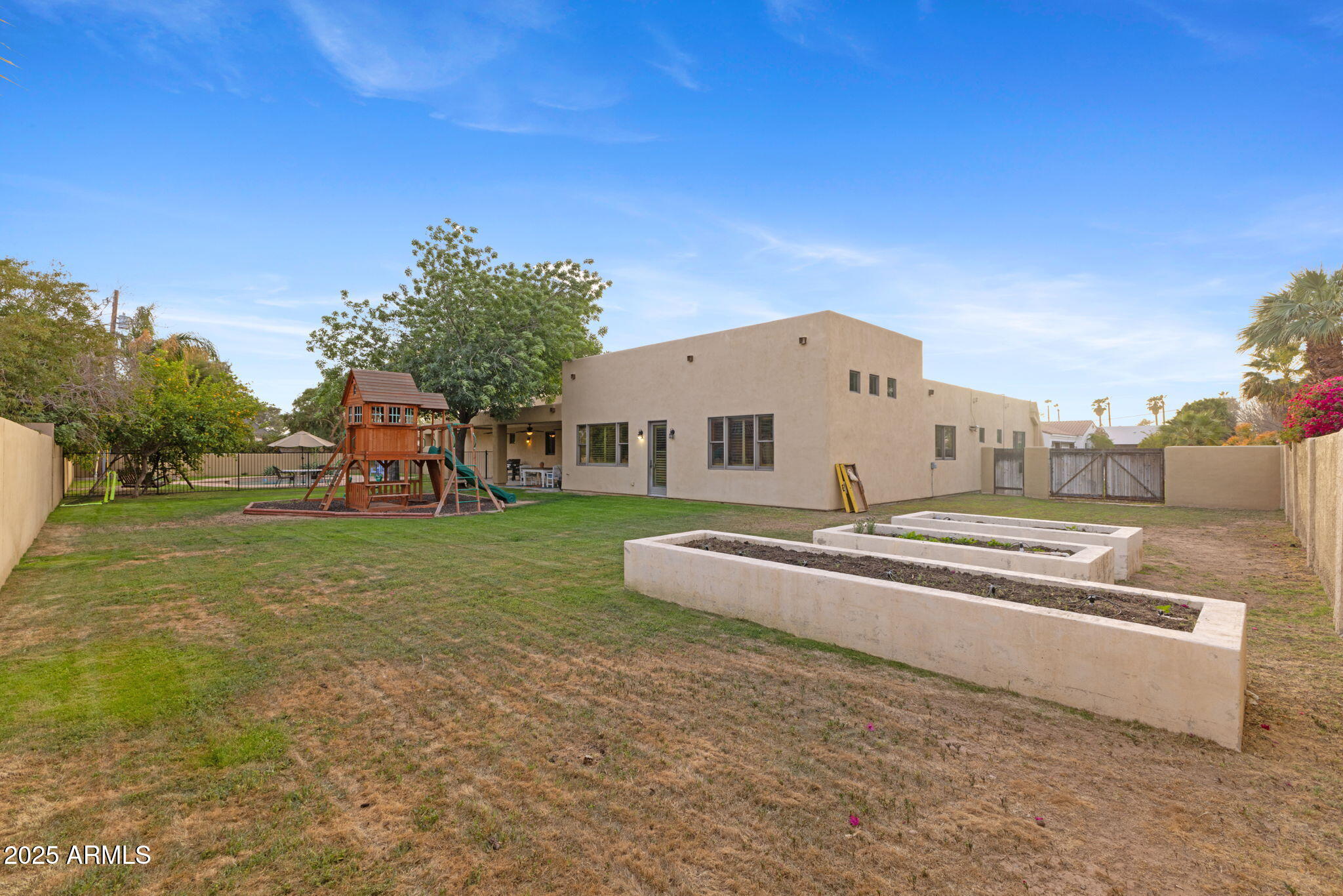 8821 North 9th Avenue Phoenix, AZ 85021 - Photo 30 of 36 a front view of a house with a yard