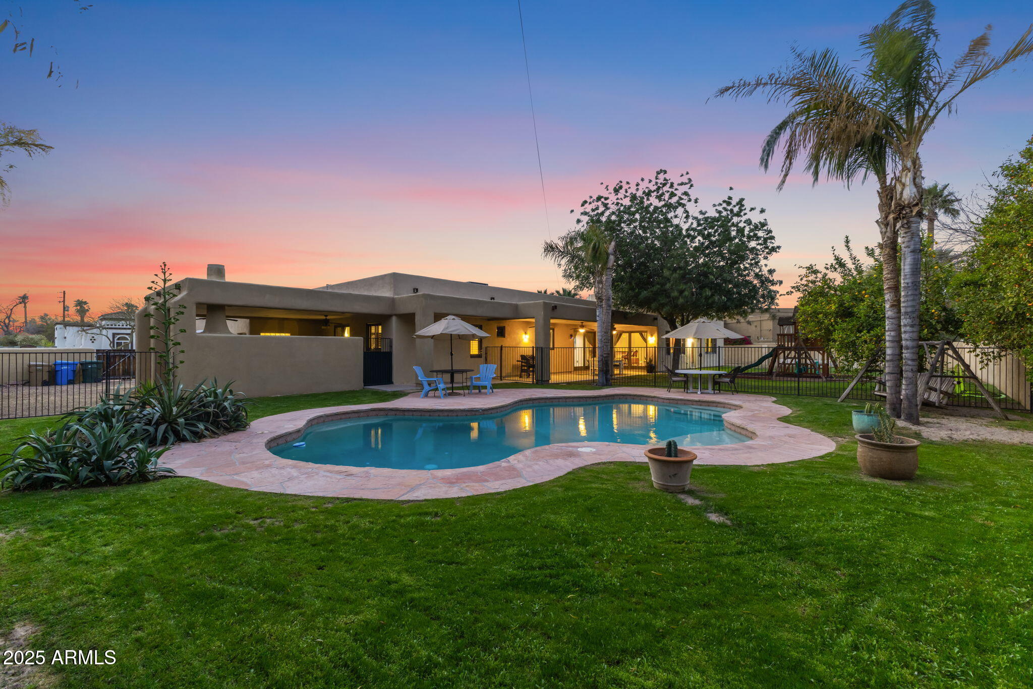 8821 North 9th Avenue Phoenix, AZ 85021 - Photo 35 of 36 a view of a house with a swimming pool