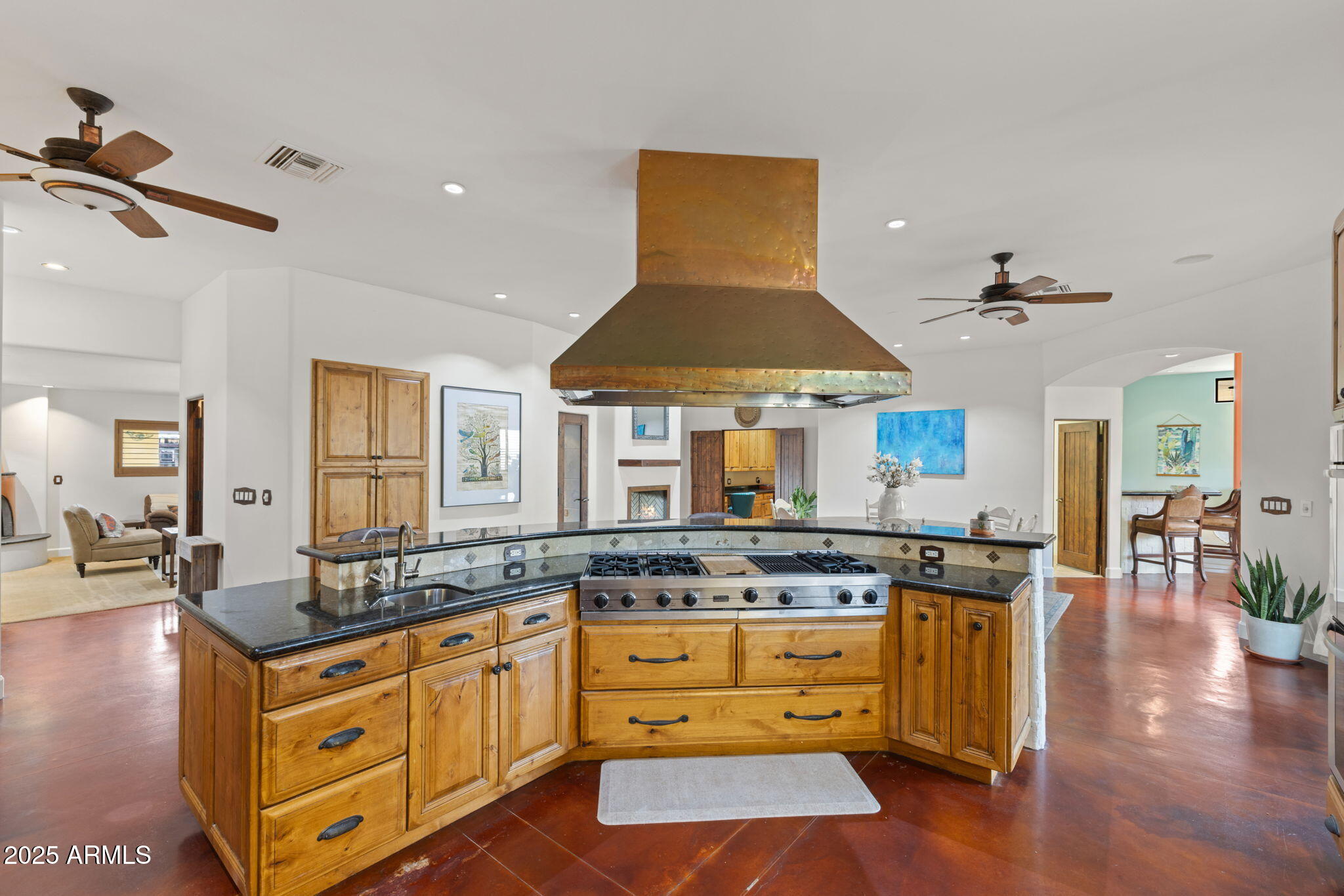 8821 North 9th Avenue Phoenix, AZ 85021 - Photo 7 of 36 a kitchen with stainless steel appliances granite countertop a stove and white cabinets