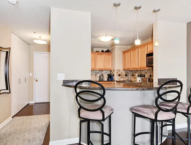 a kitchen with lots of counter space and a sink