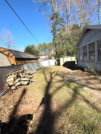 a view of a backyard of the house