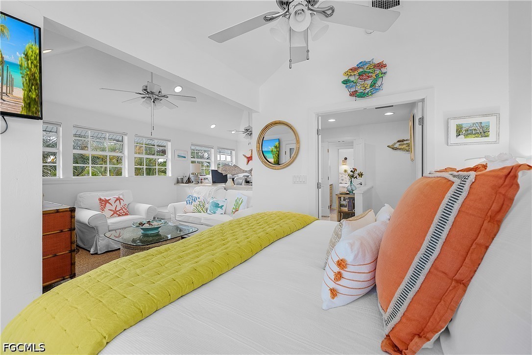 515 Useppa Useppa Island Bokeelia, FL 33922 - Photo 29 of 43 a bedroom with a bed and ceiling fan