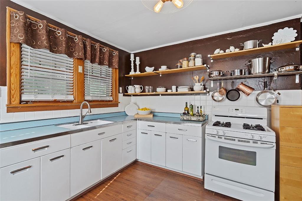 3939 Evergreen Road Pittsburgh, PA 15214 - Photo 11 of 23 Bright and cheery kitchen with open shelving