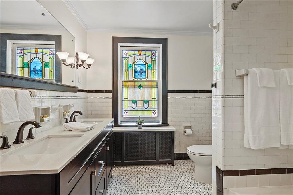 3939 Evergreen Road Pittsburgh, PA 15214 - Photo 13 of 23 Recently update spacious full bath... and just look at that stained glass!