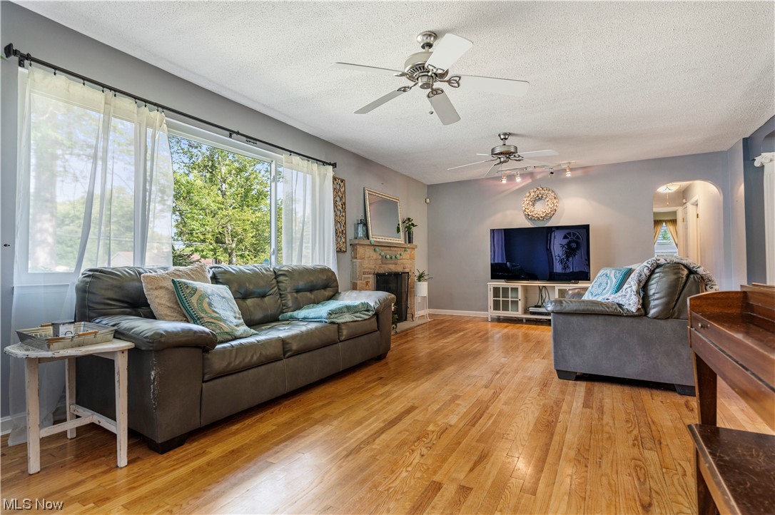 243 South Miller Road Akron, OH 44313 - Photo 5 of 19 Lots of natural light. Fireplace offered.