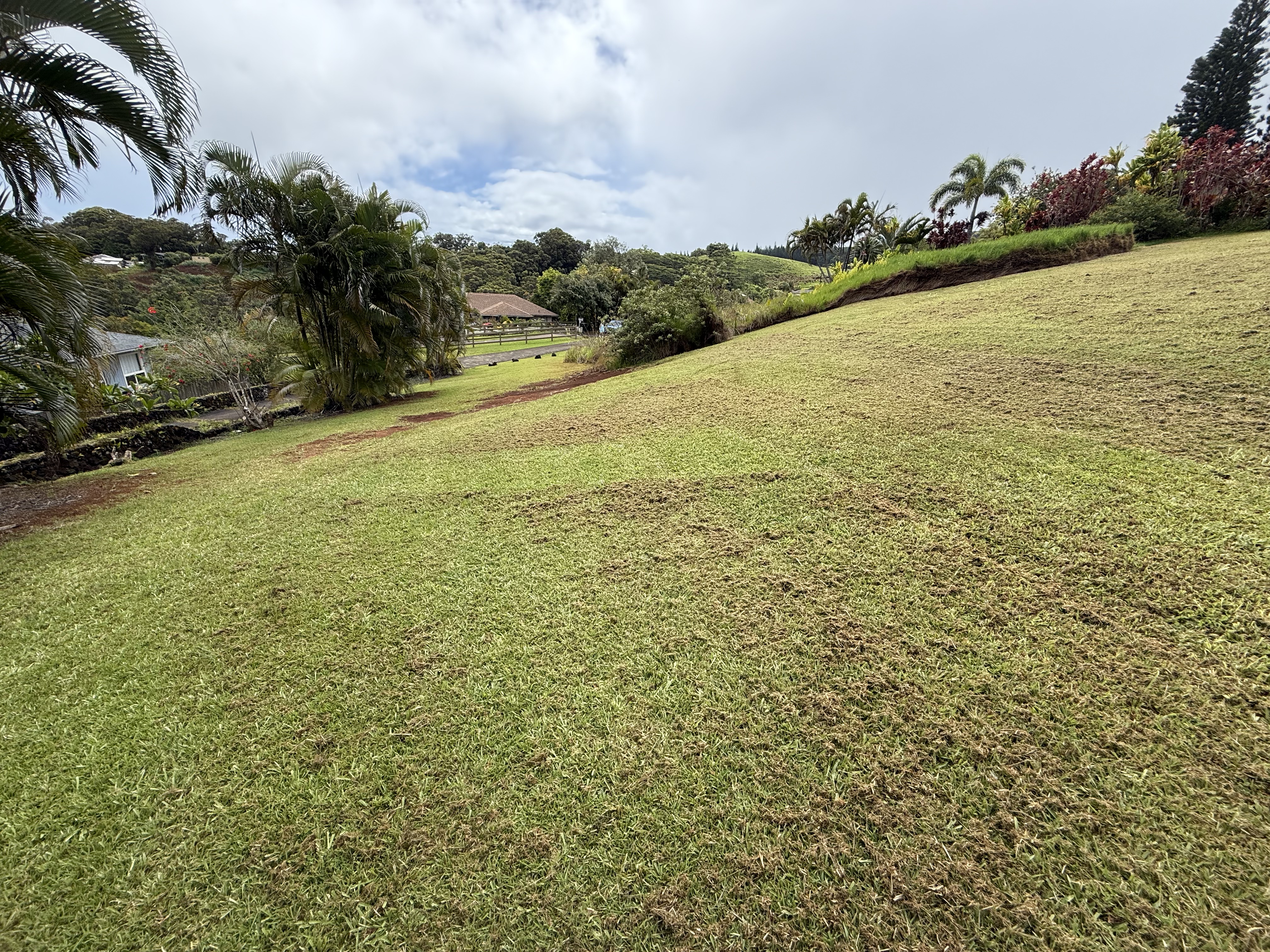5491 Puulima Road, Unit B Kalaheo, HI 96741 - Photo 1 of 3 a view of an ocean and mountain