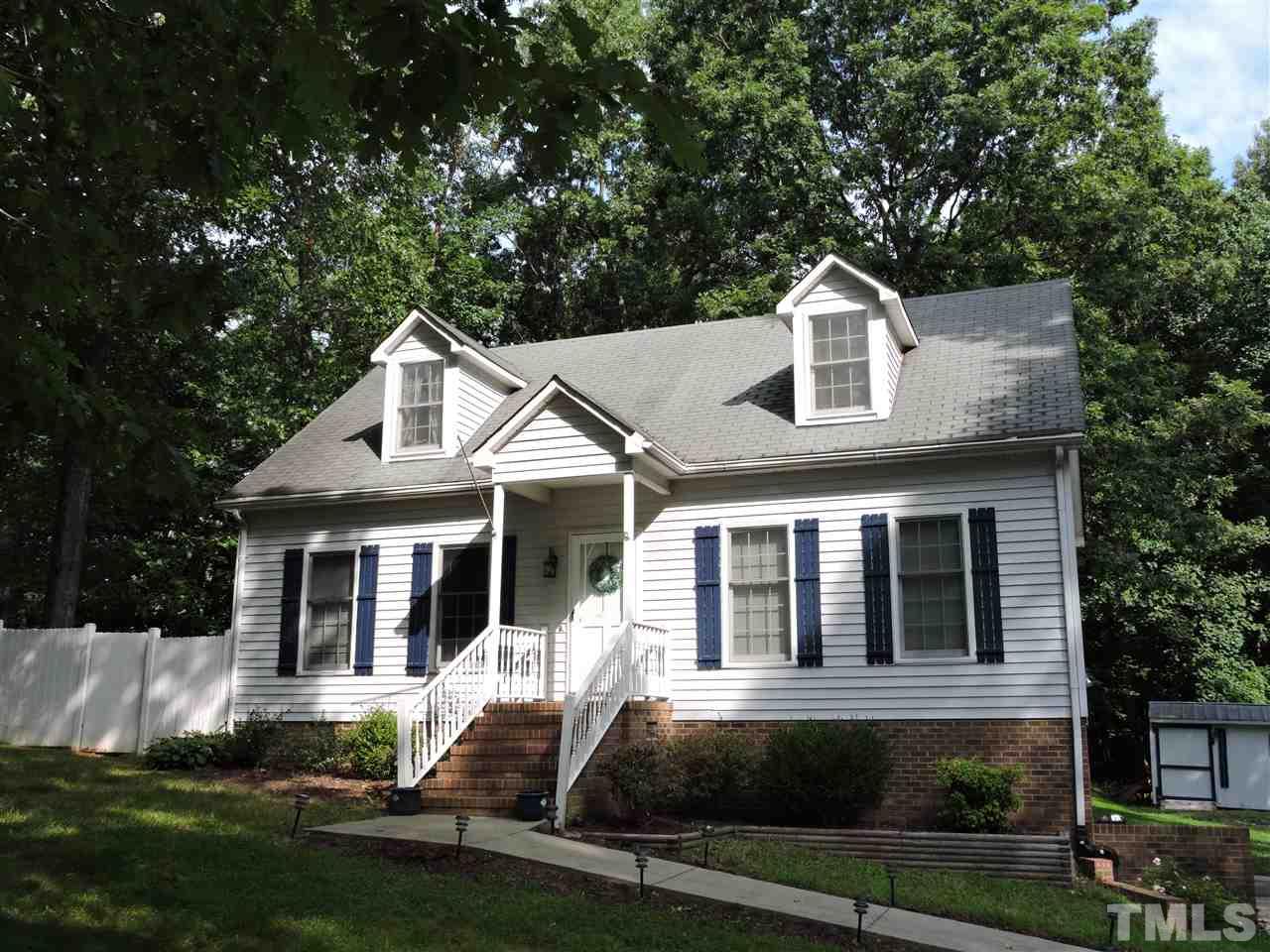26 Benjamin Court Roxboro, NC 27573 - Photo 2 of 3 a front view of a house with a yard