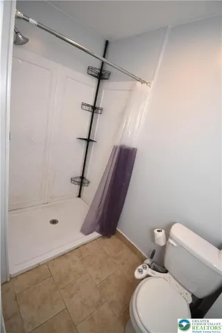 a view of kitchen and bathroom with a sink