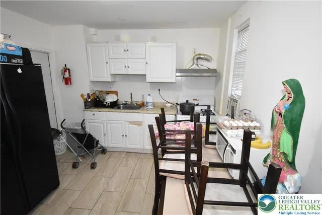 a bathroom with a toilet and a sink