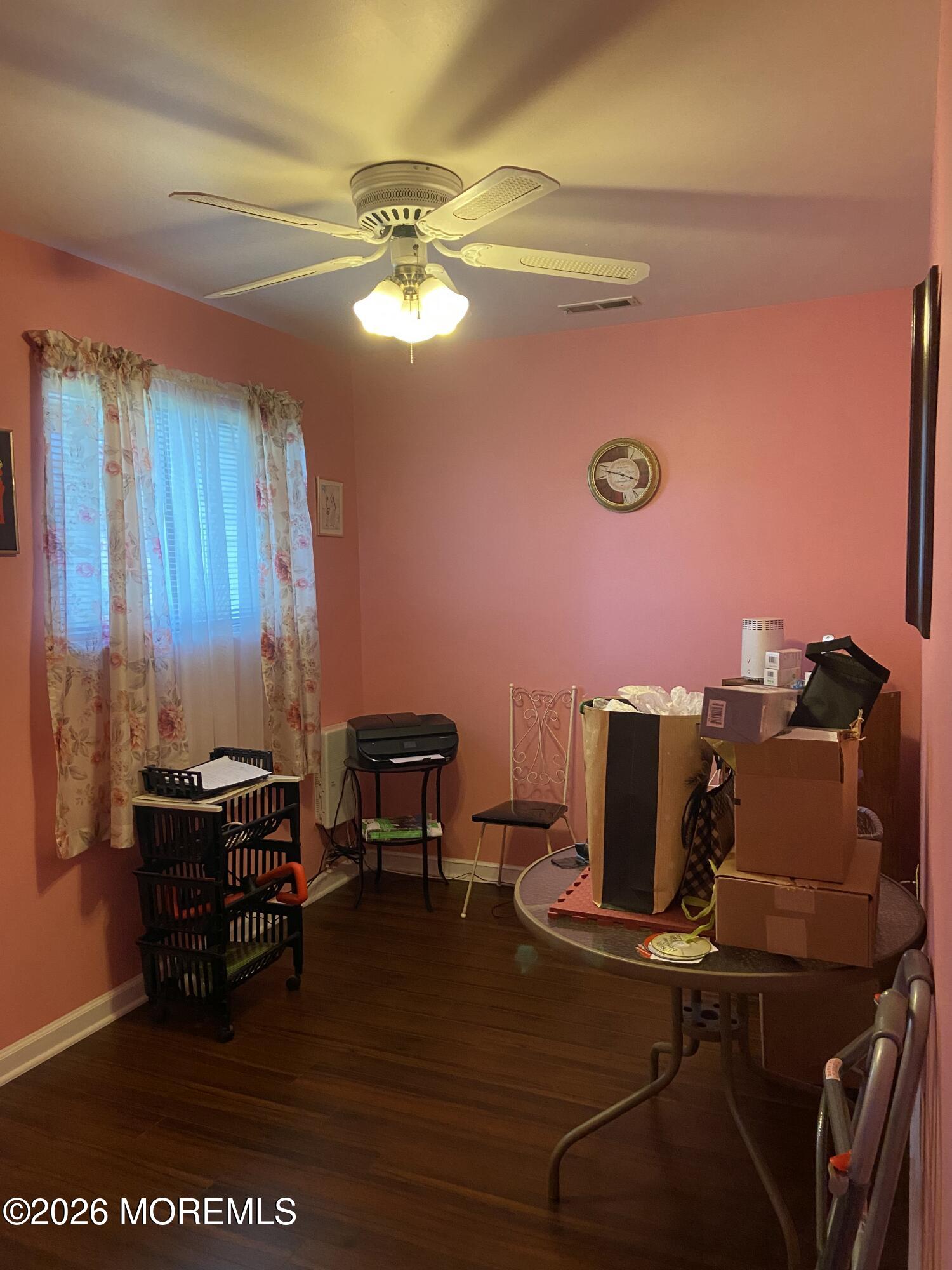 190 Spruce Street, Unit 5 Long Branch, NJ 07740 - Photo 2 of 12 a view of a workspace with furniture and a window