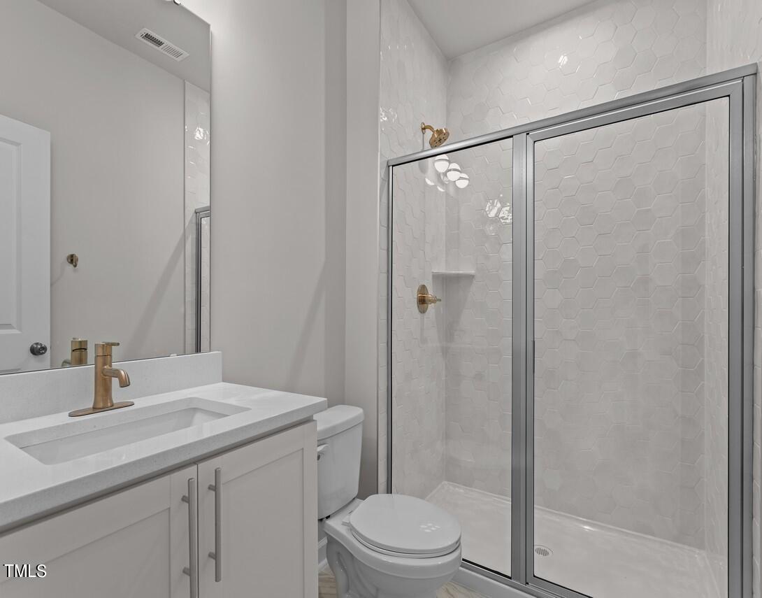 4822 Cypress Tree Lane, Unit 1 Raleigh, NC 27612 - Photo 13 of 33 1st Floor Bath