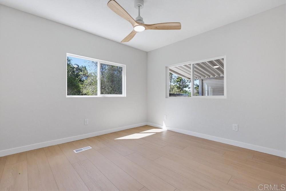 2400 Alpine Boulevard, Unit 8 Alpine, CA 91901 - Photo 10 of 19 an empty room with windows
