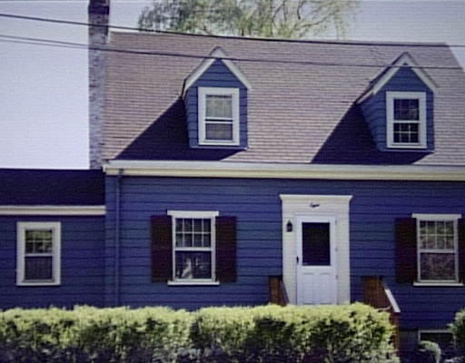 8 Maple Place Needham, MA 02492 - Photo 1 of 1 a view of a brick house with a large windows