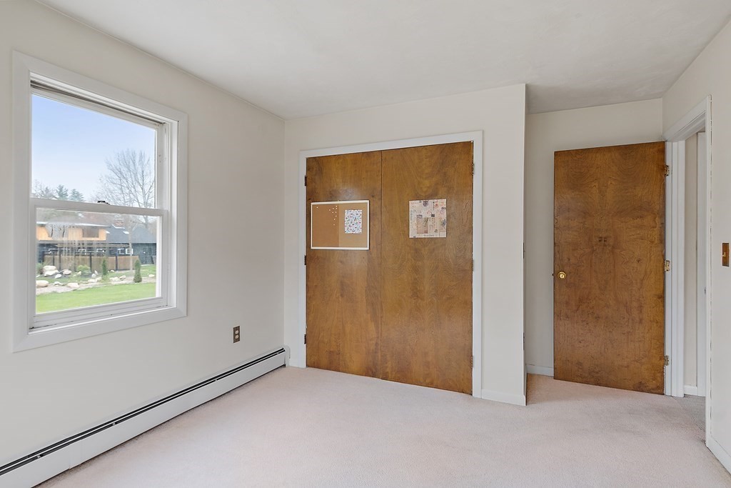 7 Gilchrist Road Townsend, MA 01469 - Photo 15 of 32 an empty room with windows