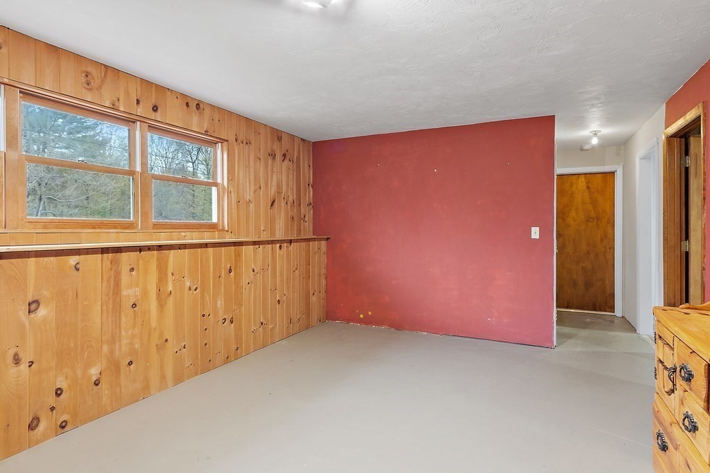 7 Gilchrist Road Townsend, MA 01469 - Photo 20 of 32 a view of an empty room with a window