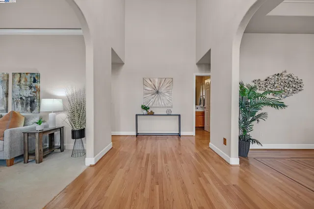 a view of a livingroom with furniture and wooden floor