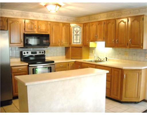 624 Blueberry Road Monroeville, PA 15146 - Photo 4 of 18 Kitchen. Beautifully updated kitchen with plenty of wood cabinets, certer island, and ceramic tile flooring. All updated kitchen appliances are included, too.