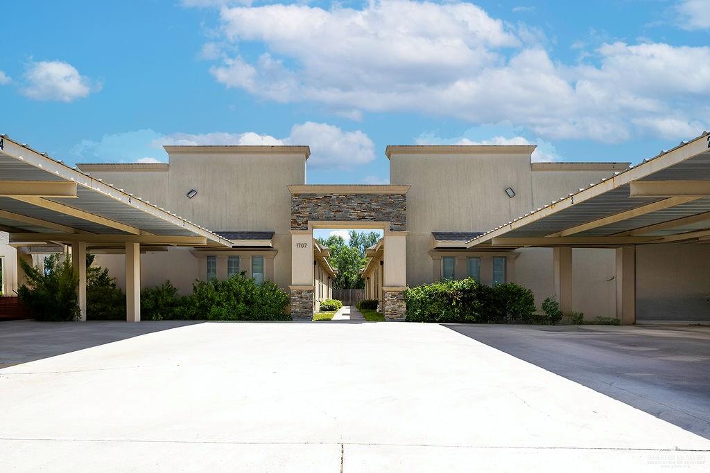 a house view with a garden space