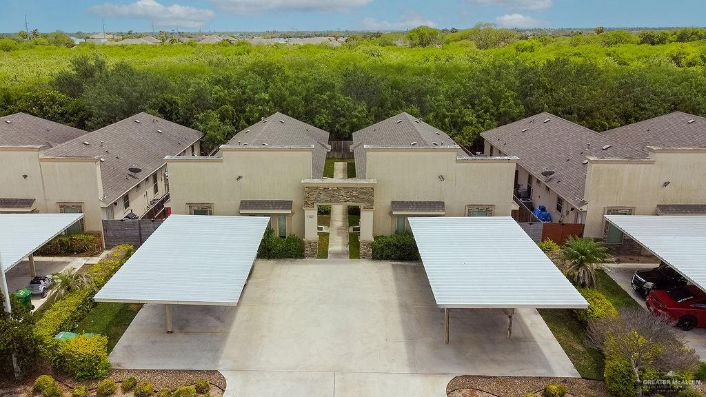 1707 West Smith Drive, Unit 2 Pharr, TX 78577 - Photo 14 of 14 an aerial view of a house with swimming pool and garden