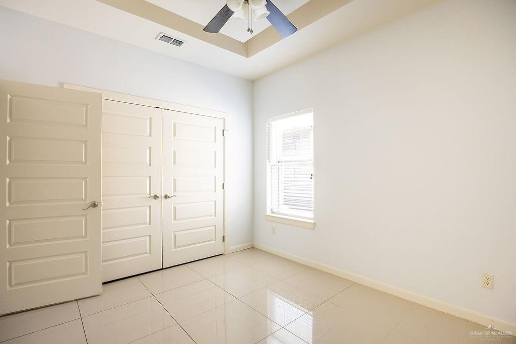 1707 West Smith Drive, Unit 2 Pharr, TX 78577 - Photo 7 of 14 an empty room with windows