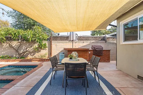 a view of a outdoor seating area with furniture
