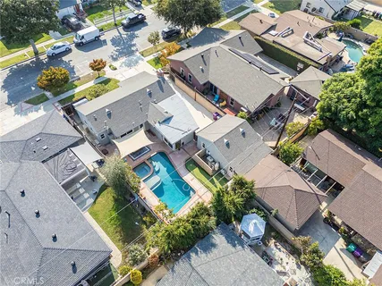 an aerial view of a house with a garden