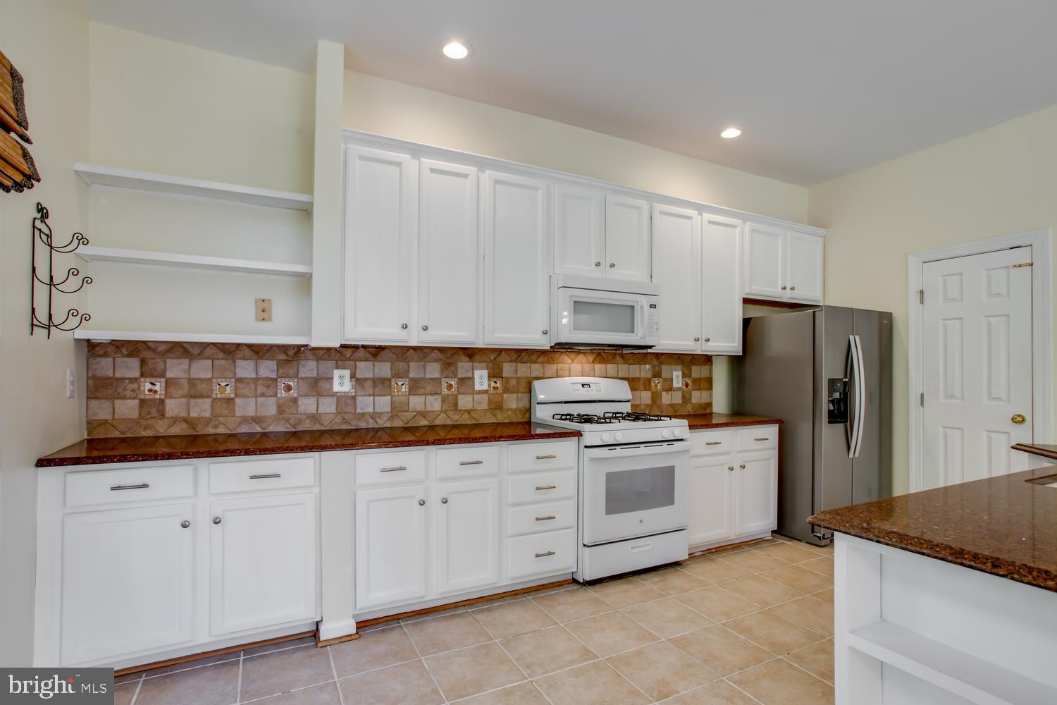 6248 Levi Court Springfield, VA 22150 - Photo 9 of 51 Bright and inviting kitchen space.