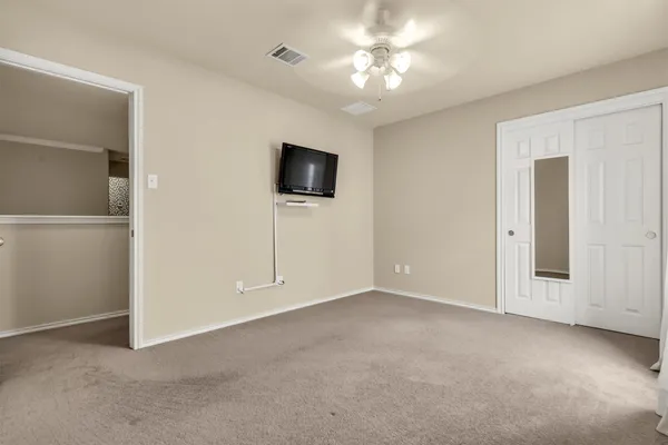 a view of a livingroom with a flat screen tv